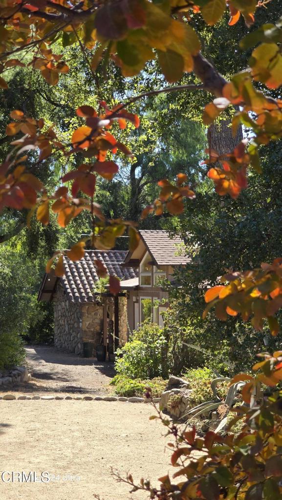 1450 McAndrew Road Ojai, CA 93023 - Photo 33 of 58 a front view of a house with a yard