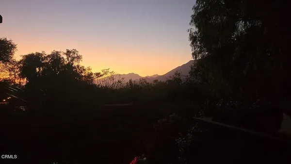 a room with lot of table and a chair