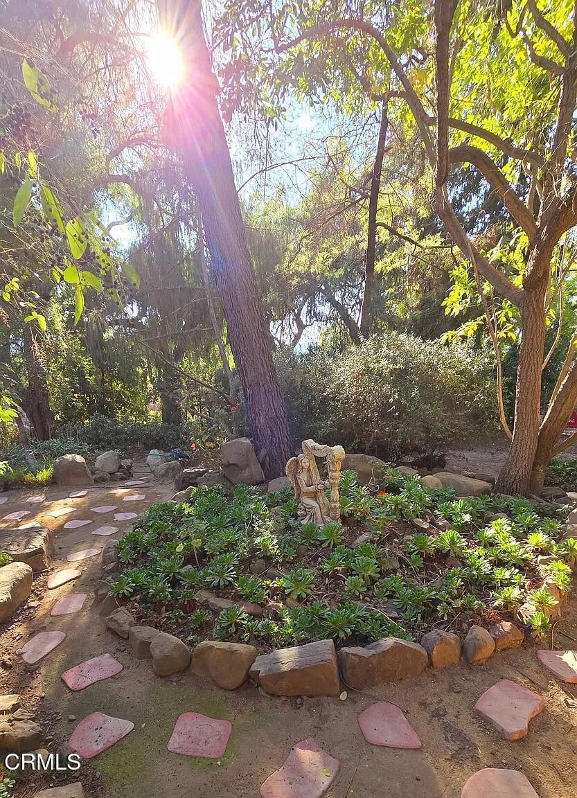 1450 McAndrew Road Ojai, CA 93023 - Photo 58 of 58 a backyard of a house with a yard and outdoor seating