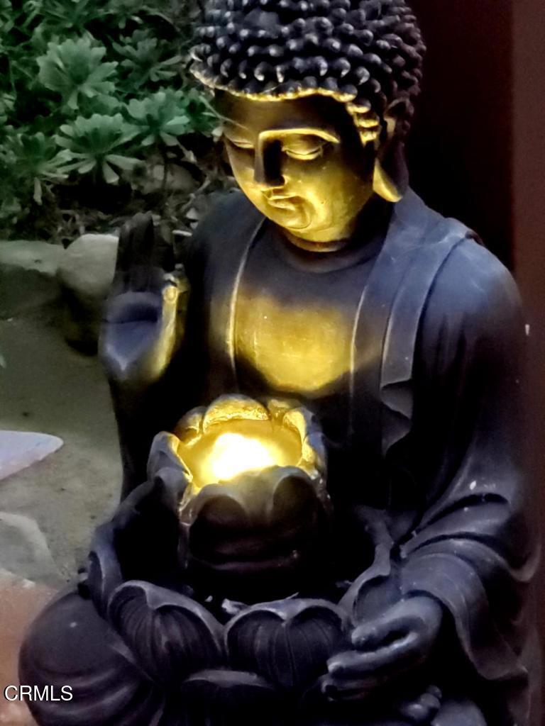 1450 McAndrew Road Ojai, CA 93023 - Photo 9 of 58 a bathroom with a sink and mirror