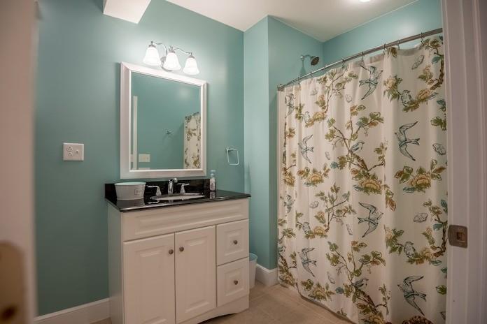 463 Gerber Road Volant, PA 16156 - Photo 17 of 25 a bathroom with a sink and a mirror