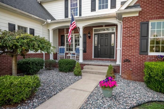 463 Gerber Road Volant, PA 16156 - Photo 2 of 25 a view of a brick house with flower pots
