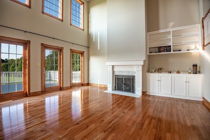 463 Gerber Road Volant, PA 16156 - Photo 4 of 25 a view of a livingroom with wooden floors and fireplace