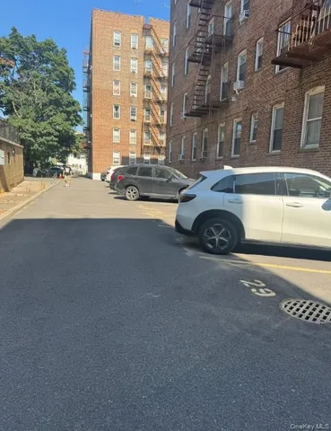 a street view with tall buildings