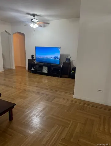 a kitchen with a refrigerator sink and cabinets