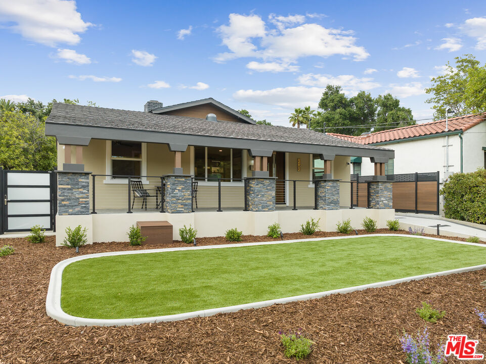 393 Allendale Road Pasadena, CA 91106 - Photo 2 of 75 a front view of a house with a yard