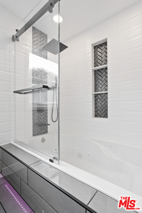 393 Allendale Road Pasadena, CA 91106 - Photo 29 of 75 a bathroom with a bathtub and a shower