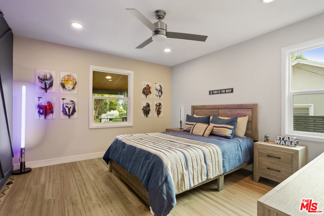 393 Allendale Road Pasadena, CA 91106 - Photo 32 of 75 a bedroom with a bed and a window