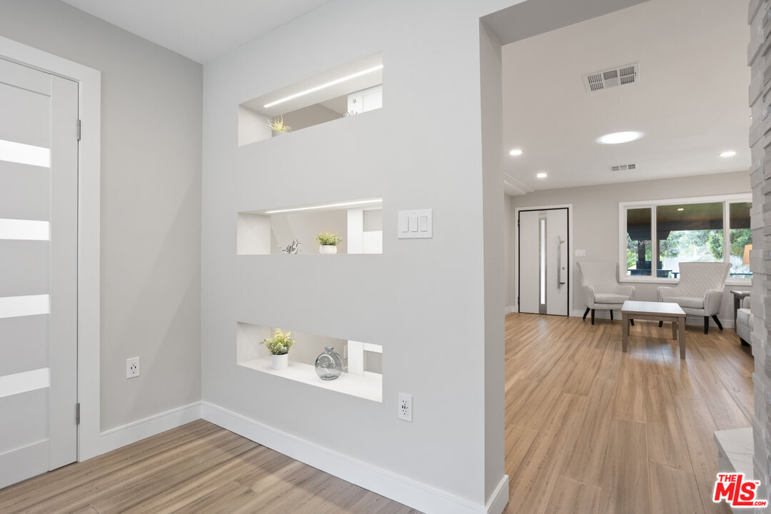 393 Allendale Road Pasadena, CA 91106 - Photo 36 of 75 a view of livingroom with furniture and wooden floor
