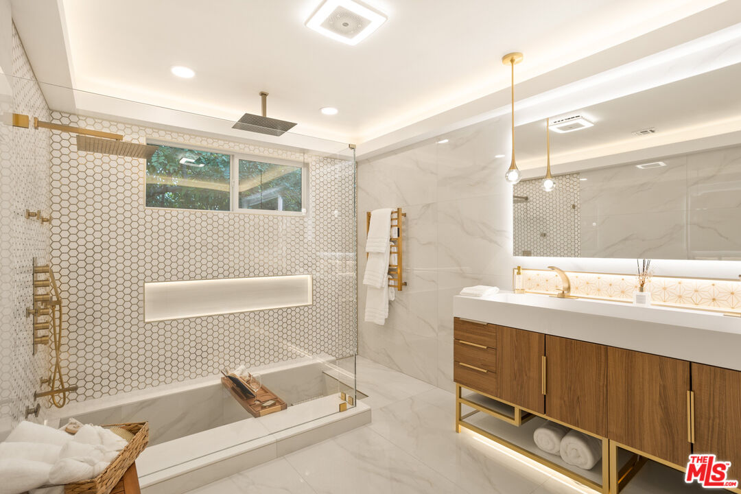 393 Allendale Road Pasadena, CA 91106 - Photo 41 of 75 a bathroom with a double vanity sink a mirror and a shower