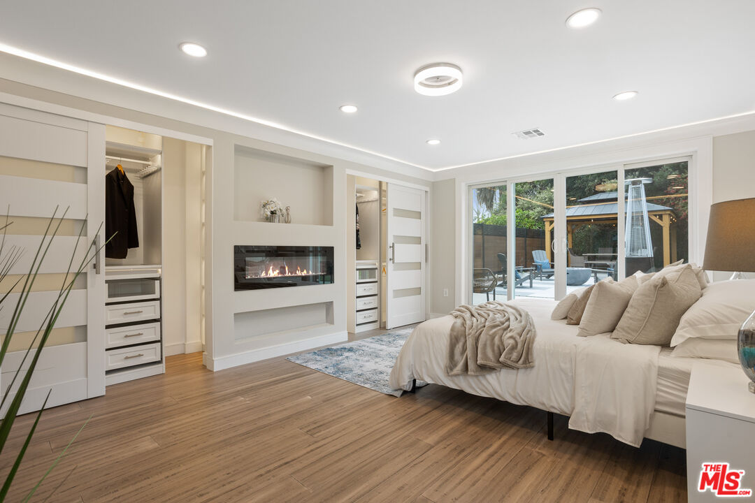 393 Allendale Road Pasadena, CA 91106 - Photo 47 of 75 a living room with furniture and a flat screen tv