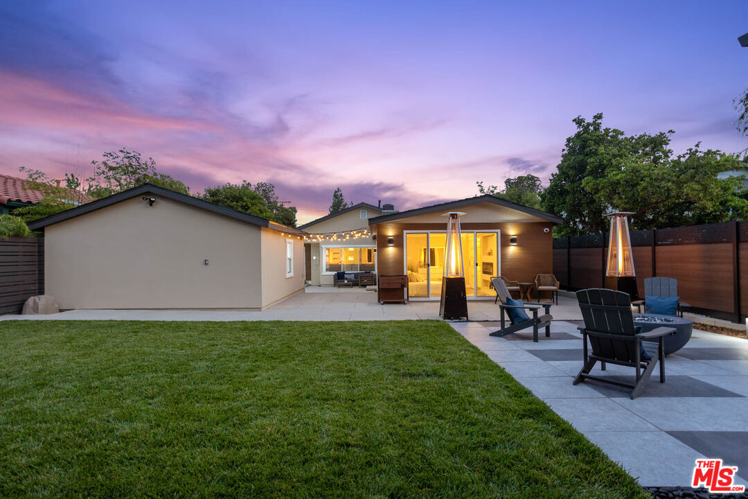 393 Allendale Road Pasadena, CA 91106 - Photo 62 of 75 a view of a house with a backyard and sitting area