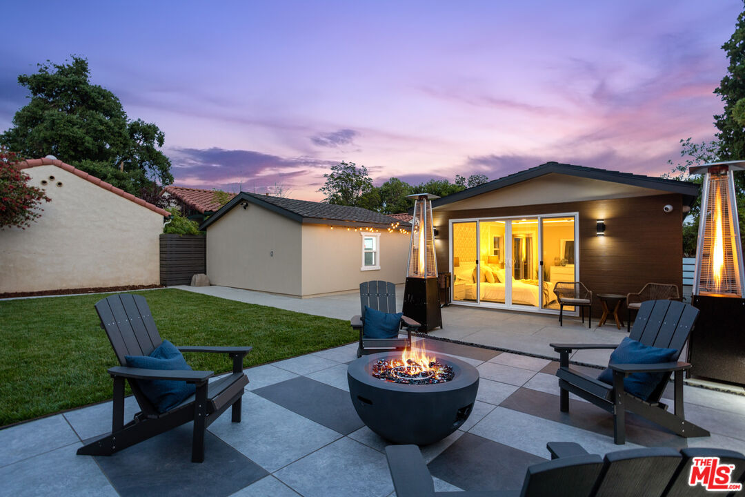 393 Allendale Road Pasadena, CA 91106 - Photo 63 of 75 a backyard of a house with yard and outdoor seating