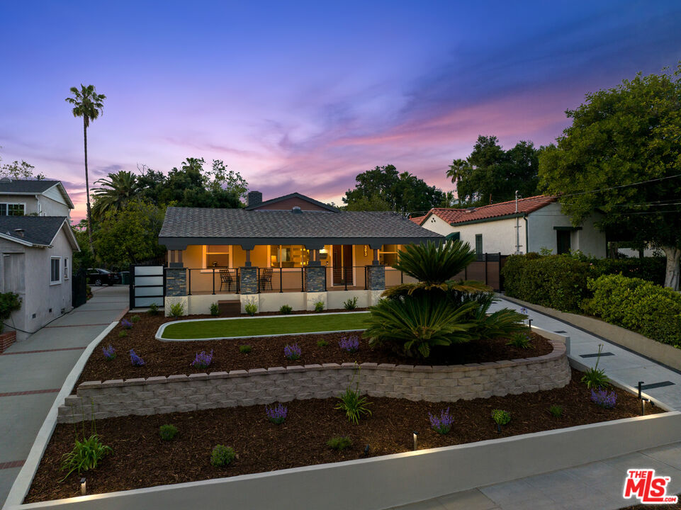 393 Allendale Road Pasadena, CA 91106 - Photo 71 of 75 a front view of a house with a garden