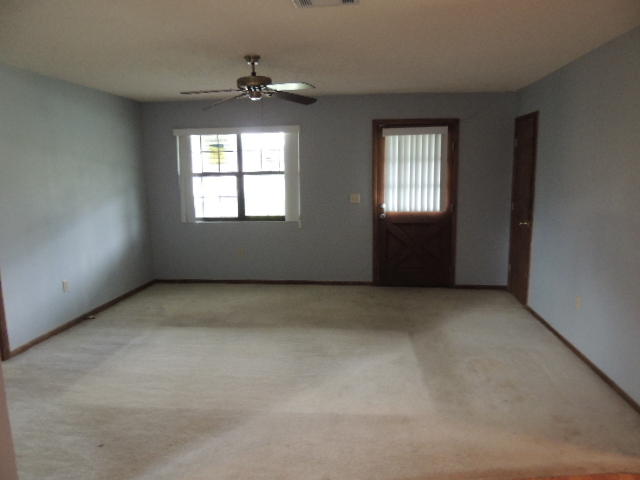 2637 Southwest Ace Road Port St. Lucie, FL 34953 - Photo 23 of 32 Living Room
