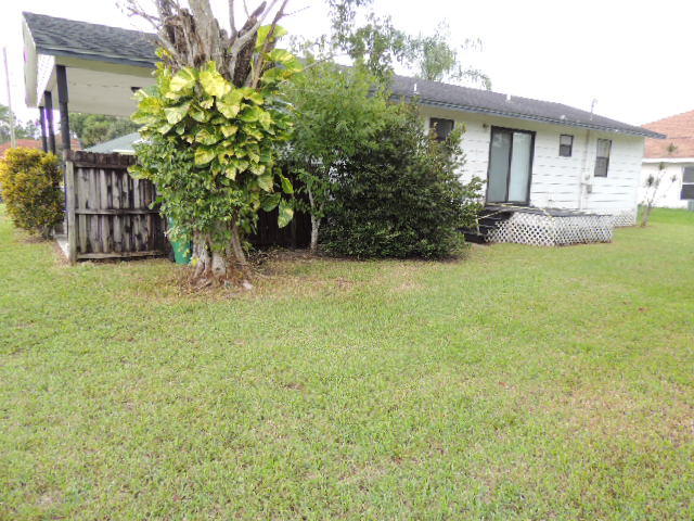 2637 Southwest Ace Road Port St. Lucie, FL 34953 - Photo 28 of 32 Rear Side