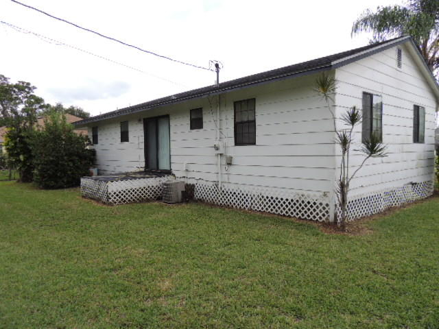 2637 Southwest Ace Road Port St. Lucie, FL 34953 - Photo 30 of 32 RearSide