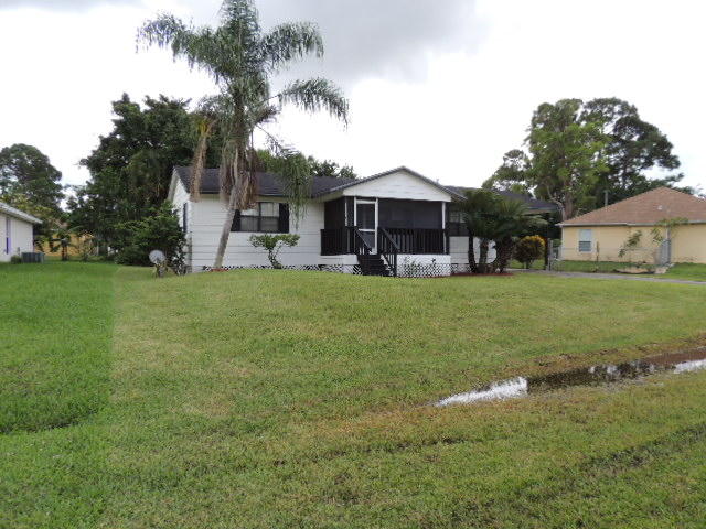 2637 Southwest Ace Road Port St. Lucie, FL 34953 - Photo 3 of 32 Side Left
