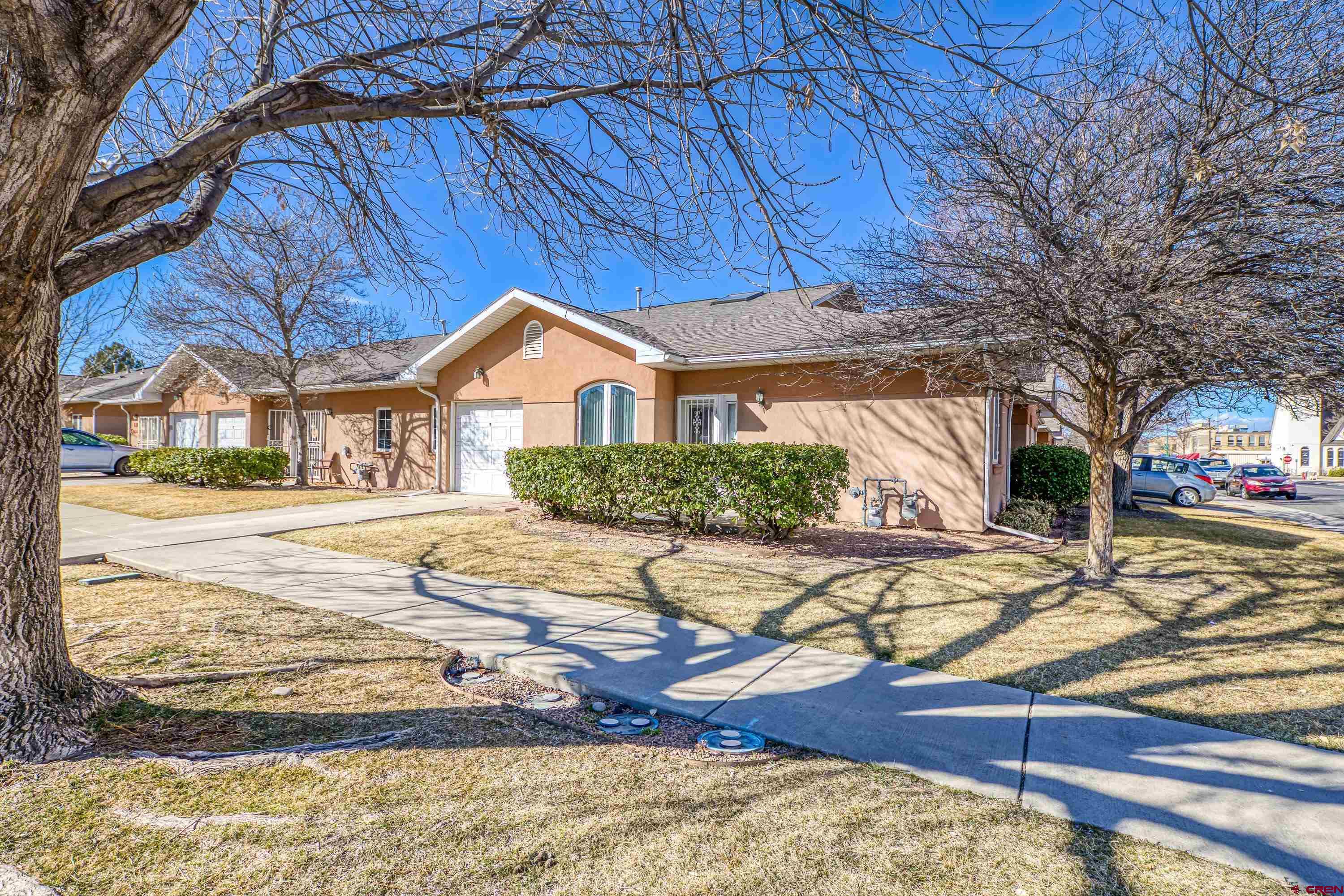 401 Grand Avenue, Unit B Delta, CO 81416 - Photo 1 of 14 a view of outdoor space yard and swimming pool