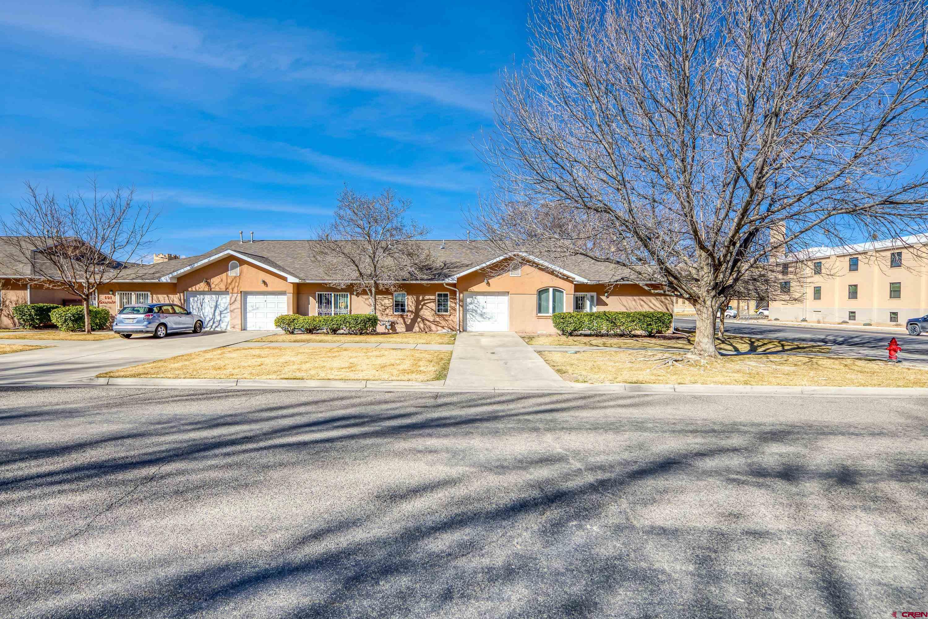 401 Grand Avenue, Unit B Delta, CO 81416 - Photo 12 of 14 Driveway and Entrance from Grand Avenue