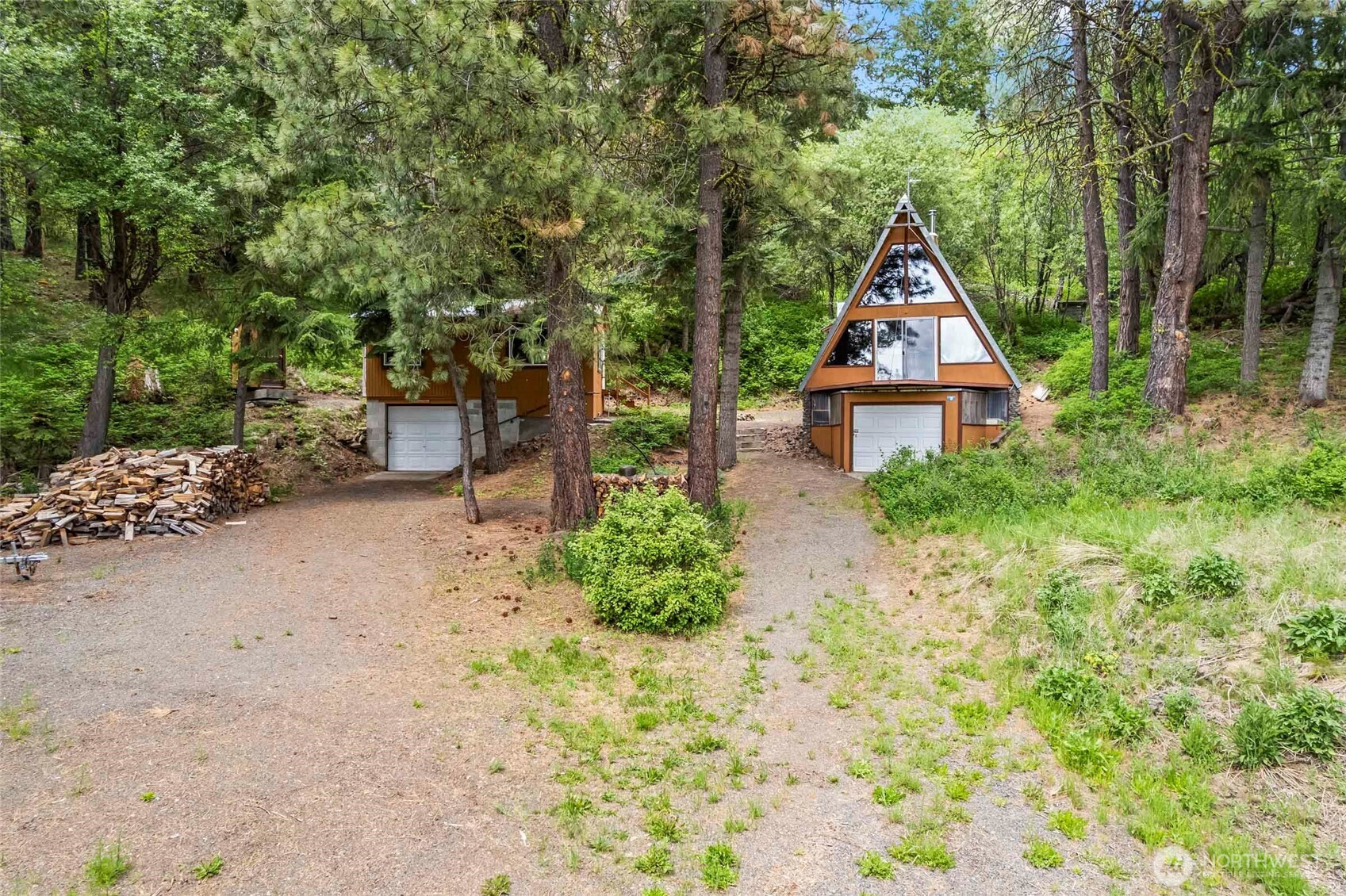 181 Elk Road Cle Elum, WA 98922 - Photo 2 of 31 a front view of a house with a yard