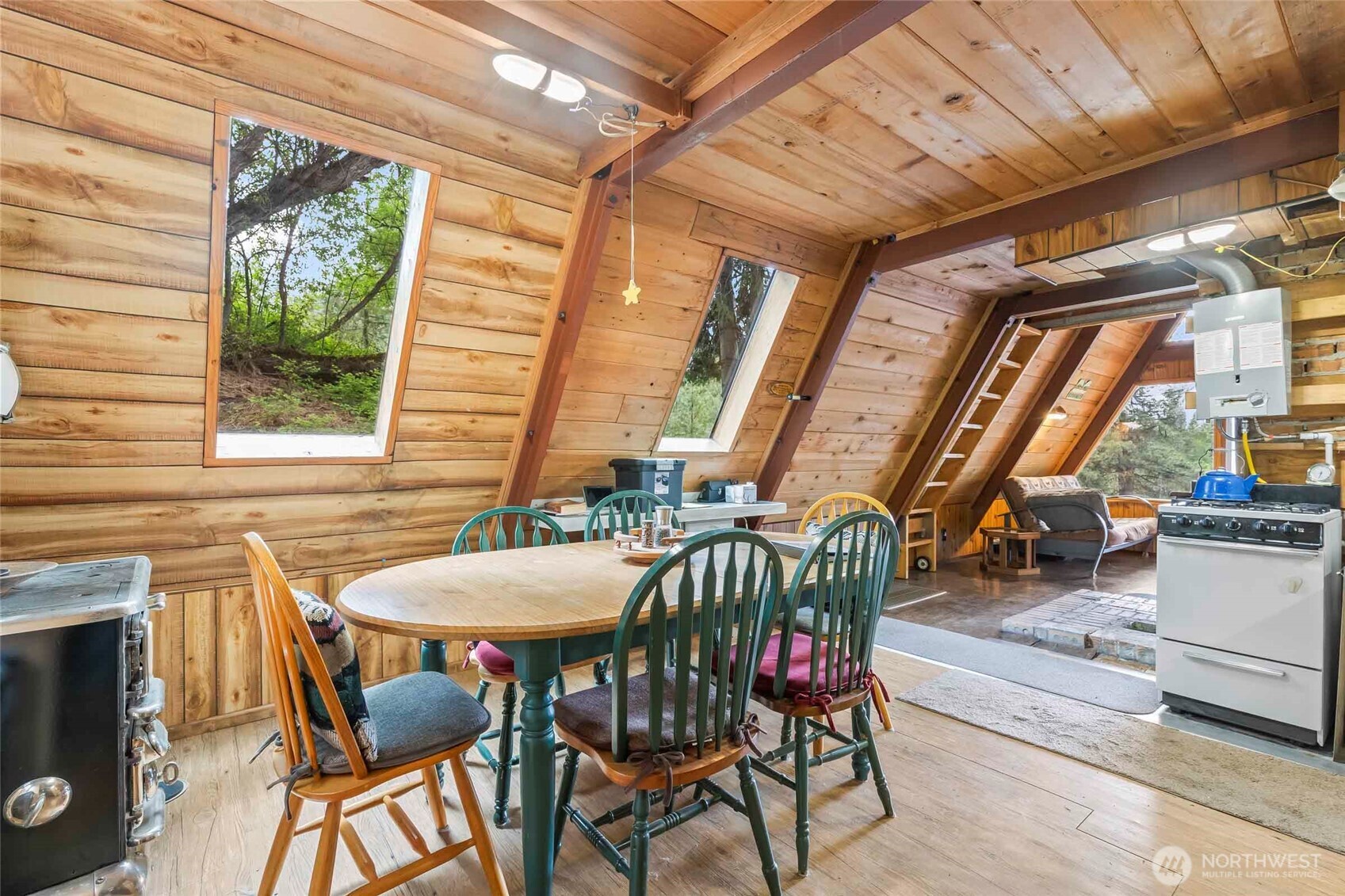 181 Elk Road Cle Elum, WA 98922 - Photo 5 of 31 a view of a dining room with furniture window and outside view