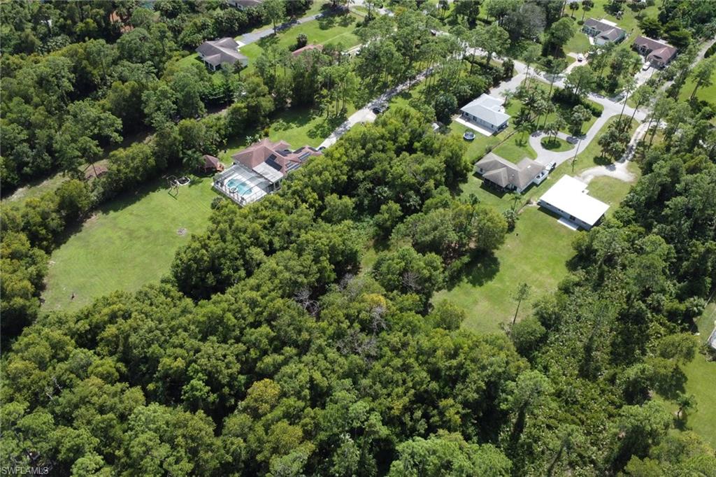 3341 2nd Avenue Southeast Naples, FL 34117 - Photo 30 of 43 an aerial view of a house with yard