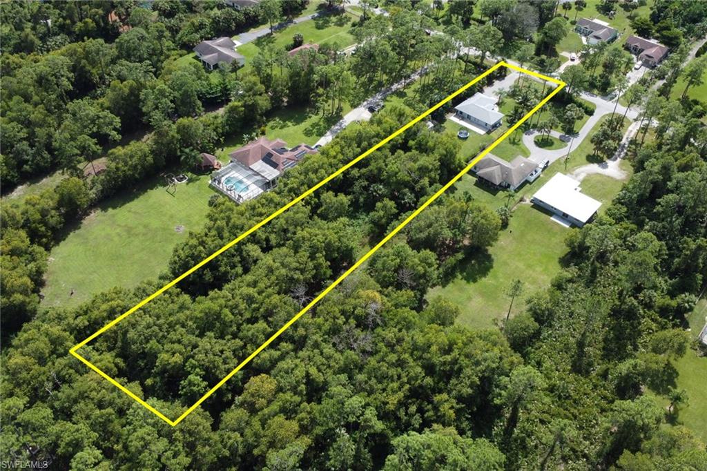 3341 2nd Avenue Southeast Naples, FL 34117 - Photo 31 of 43 an aerial view of a tennis court