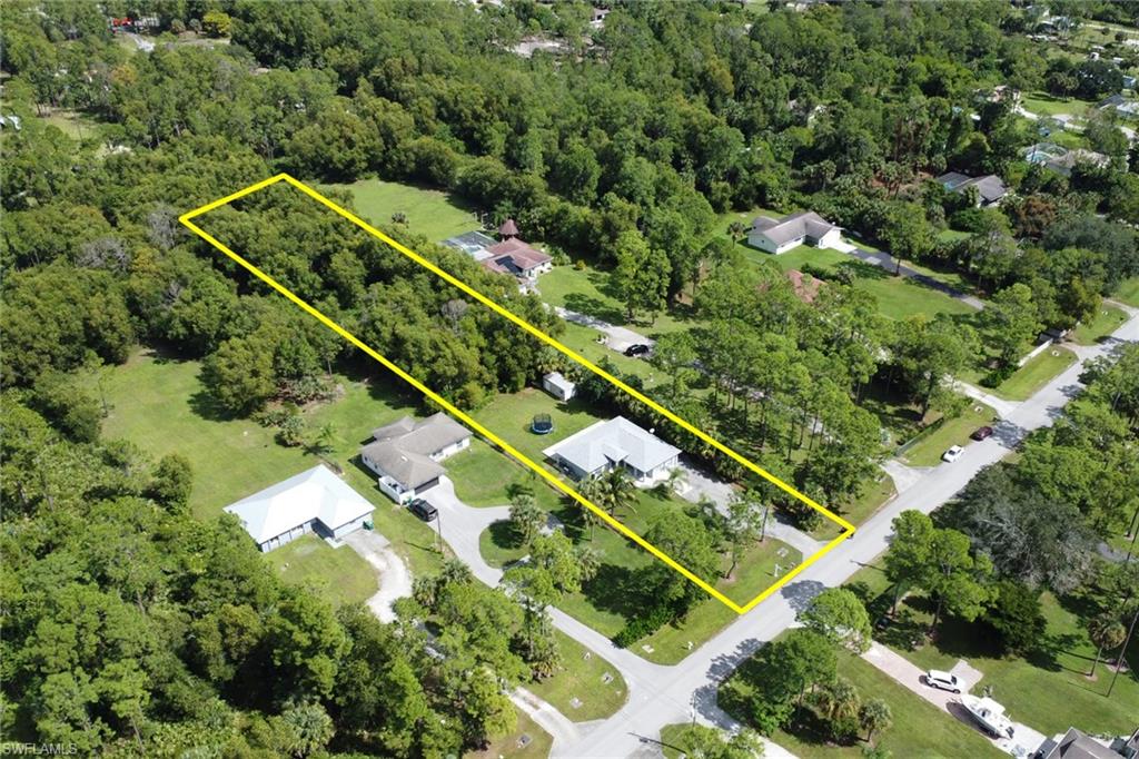 3341 2nd Avenue Southeast Naples, FL 34117 - Photo 40 of 43 an aerial view of house with yard