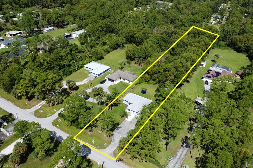 3341 2nd Avenue Southeast Naples, FL 34117 - Photo 42 of 43 an aerial view of a tennis court