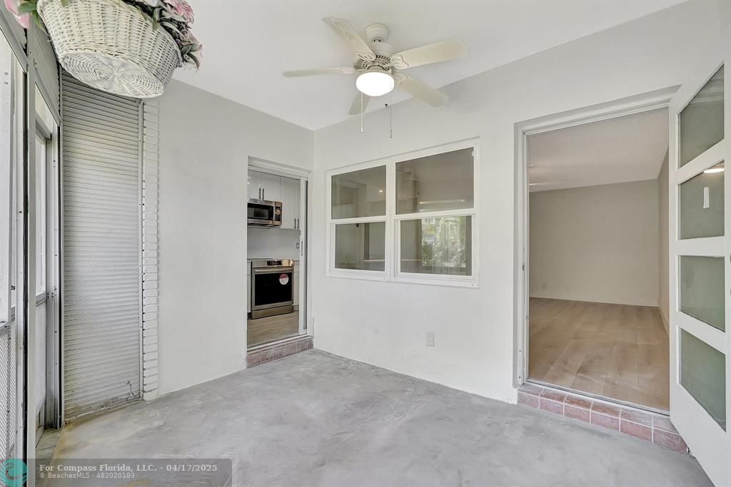 161 Northeast 10th Avenue, Unit 14A Hallandale Beach, FL 33009 - Photo 23 of 45 a view of an empty room with a window