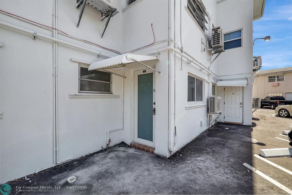 161 Northeast 10th Avenue, Unit 14A Hallandale Beach, FL 33009 - Photo 29 of 45 a view of a garage