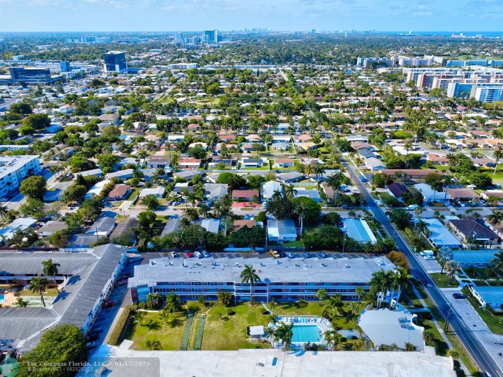 161 Northeast 10th Avenue, Unit 14A Hallandale Beach, FL 33009 - Photo 41 of 45 an aerial view of multiple house