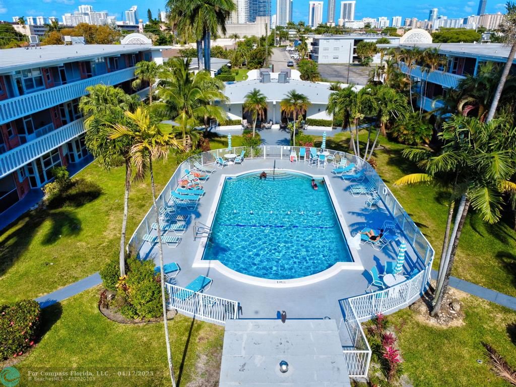 161 Northeast 10th Avenue, Unit 14A Hallandale Beach, FL 33009 - Photo 45 of 45 aerial view of a swimming pool