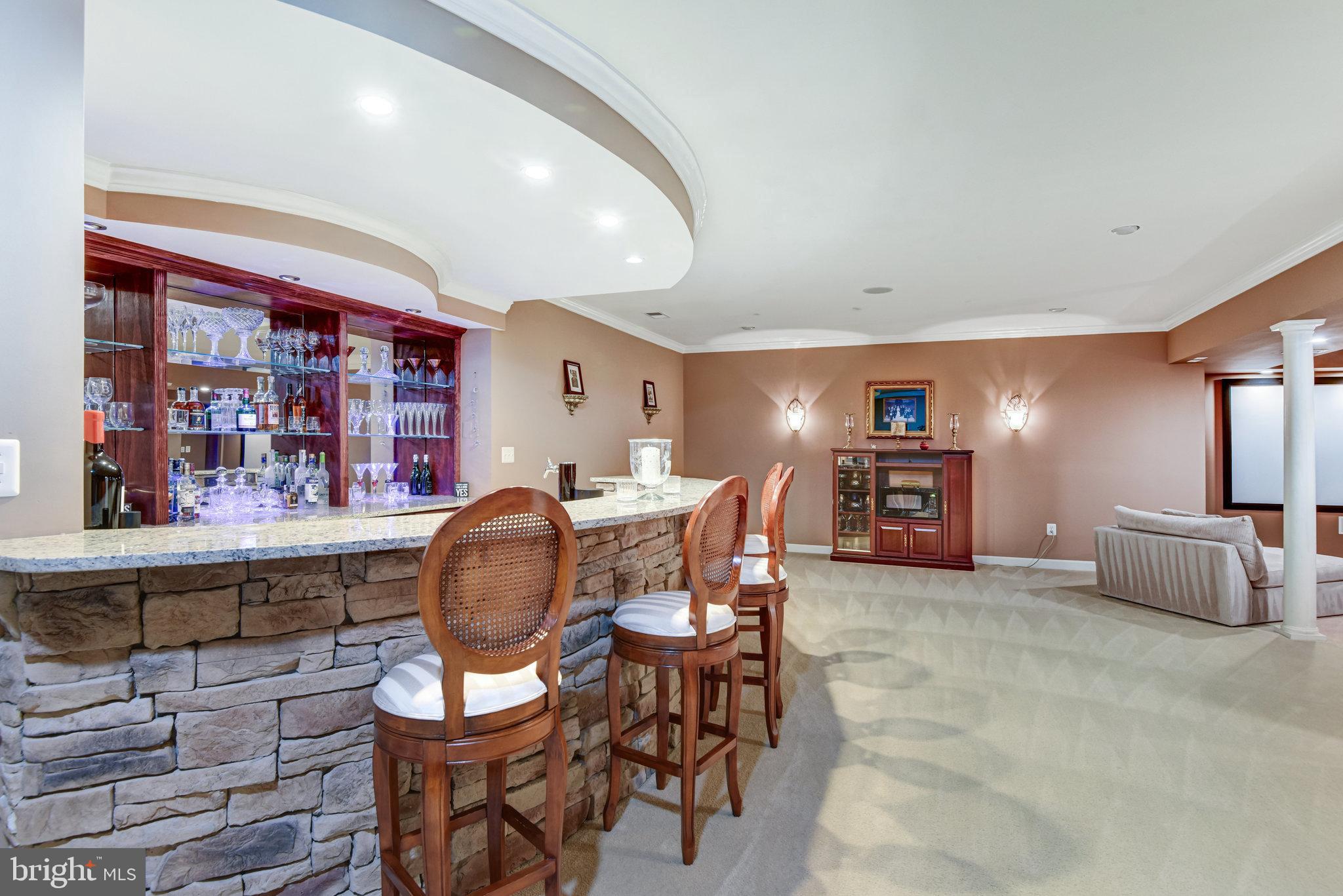 24958 Brookbark Terrace Chantilly, VA 20152 - Photo 18 of 26 a dining room with furniture and chandelier