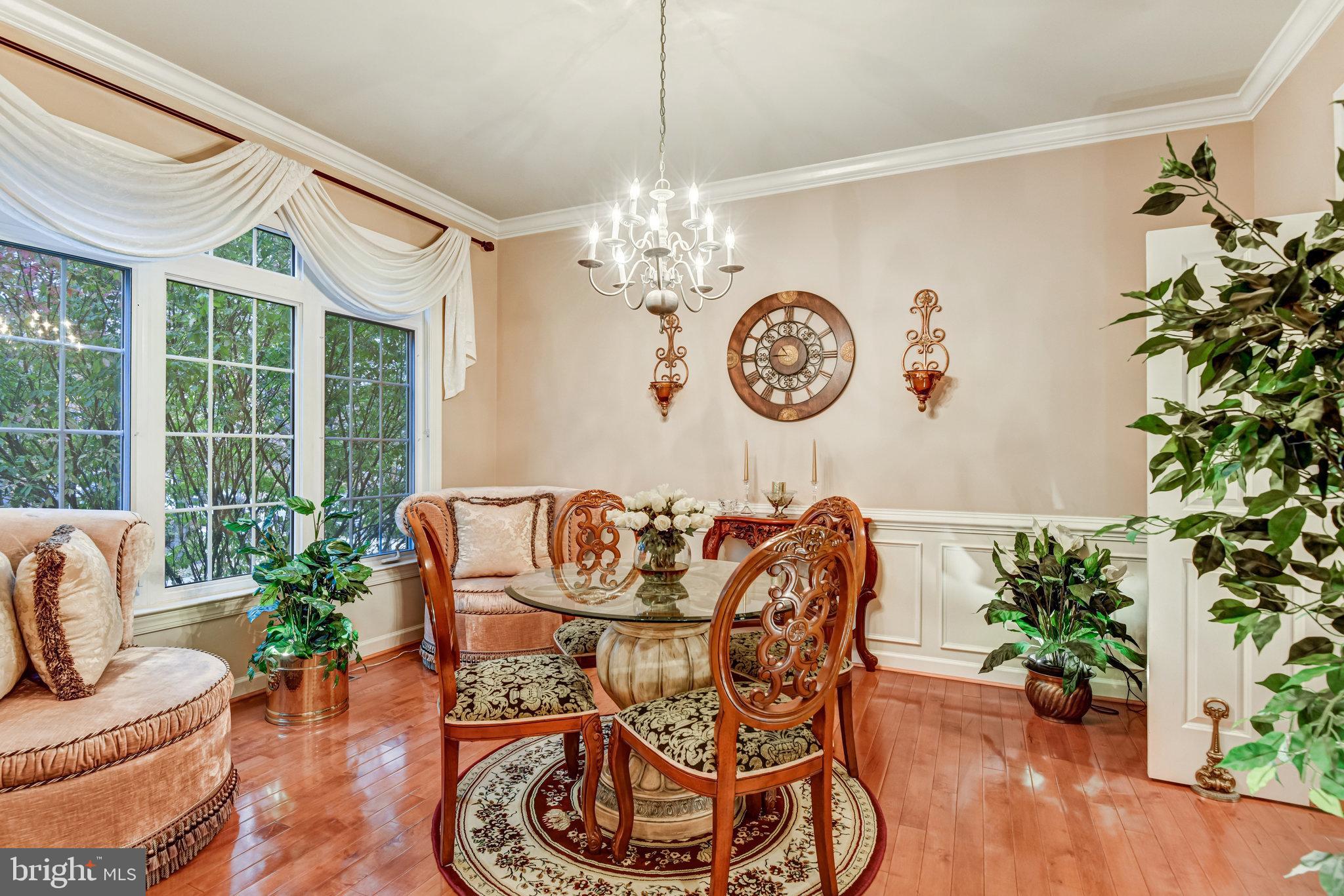 24958 Brookbark Terrace Chantilly, VA 20152 - Photo 6 of 26 a view of a dining room with furniture window and outside view