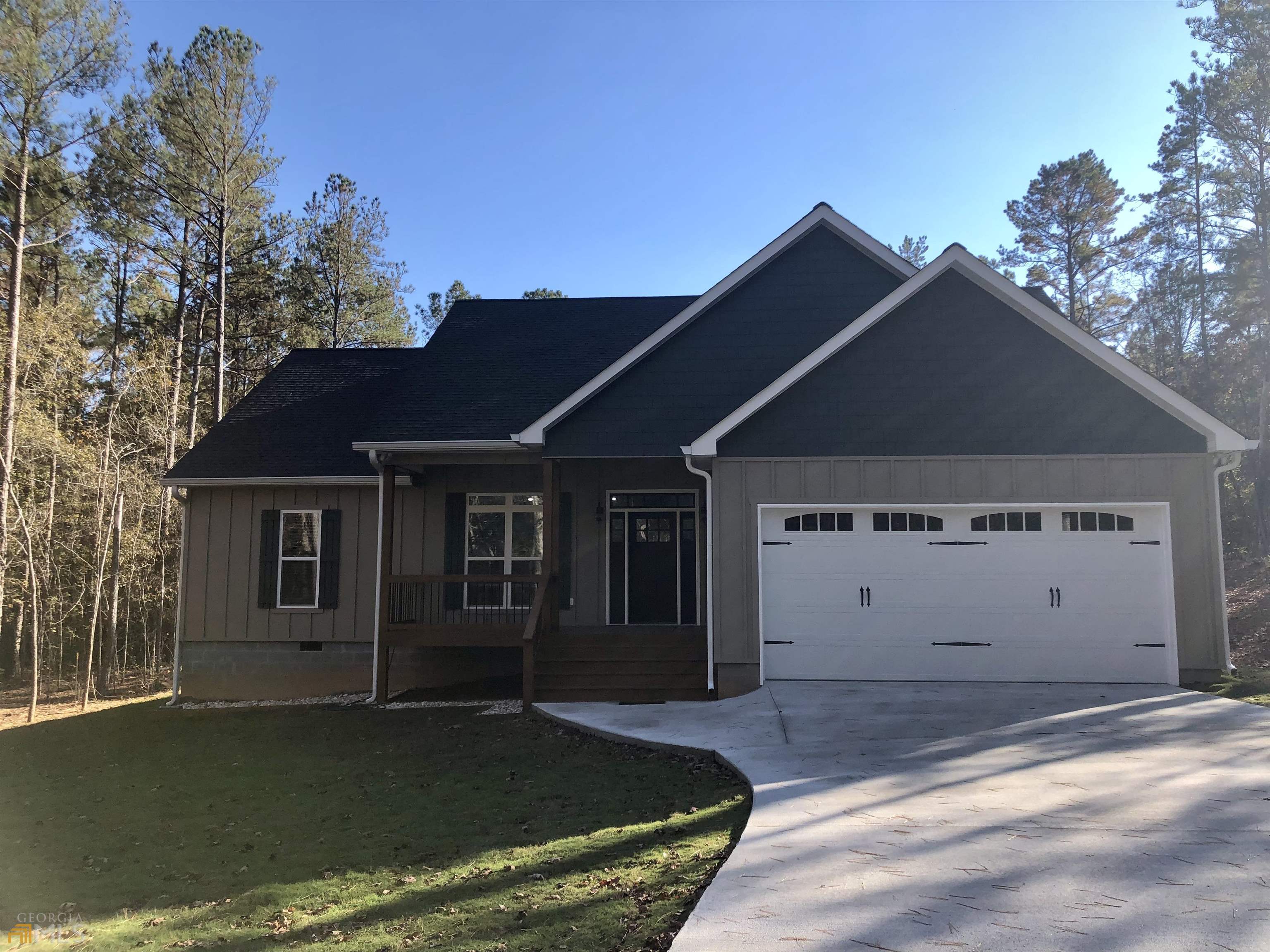 136 Riverside Street Franklin, GA 30217 - Photo 1 of 1 a view of a house with backyard