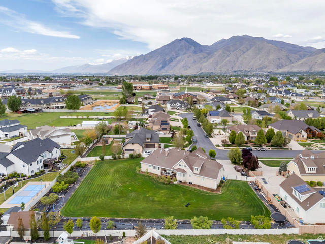 1355 West 1000 South Mapleton, UT 84664 - Photo 66 of 74 Aerial perspective of suburban area with a mountainous background