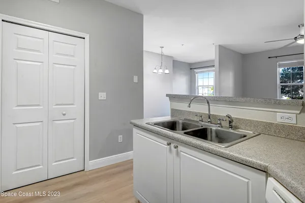 a close view of a sink and a window in a room