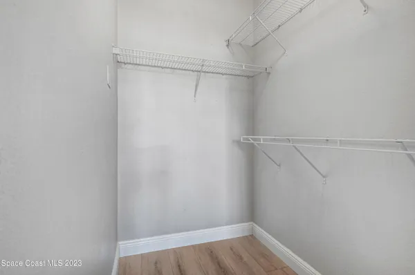 a view of an empty walk in closet