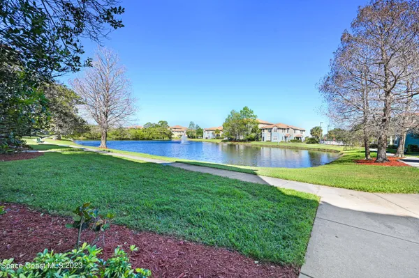 a view of a garden with houses