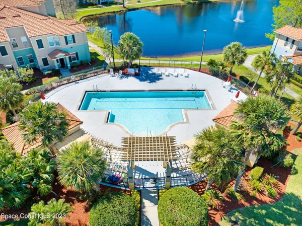 a view of a swimming pool with a patio