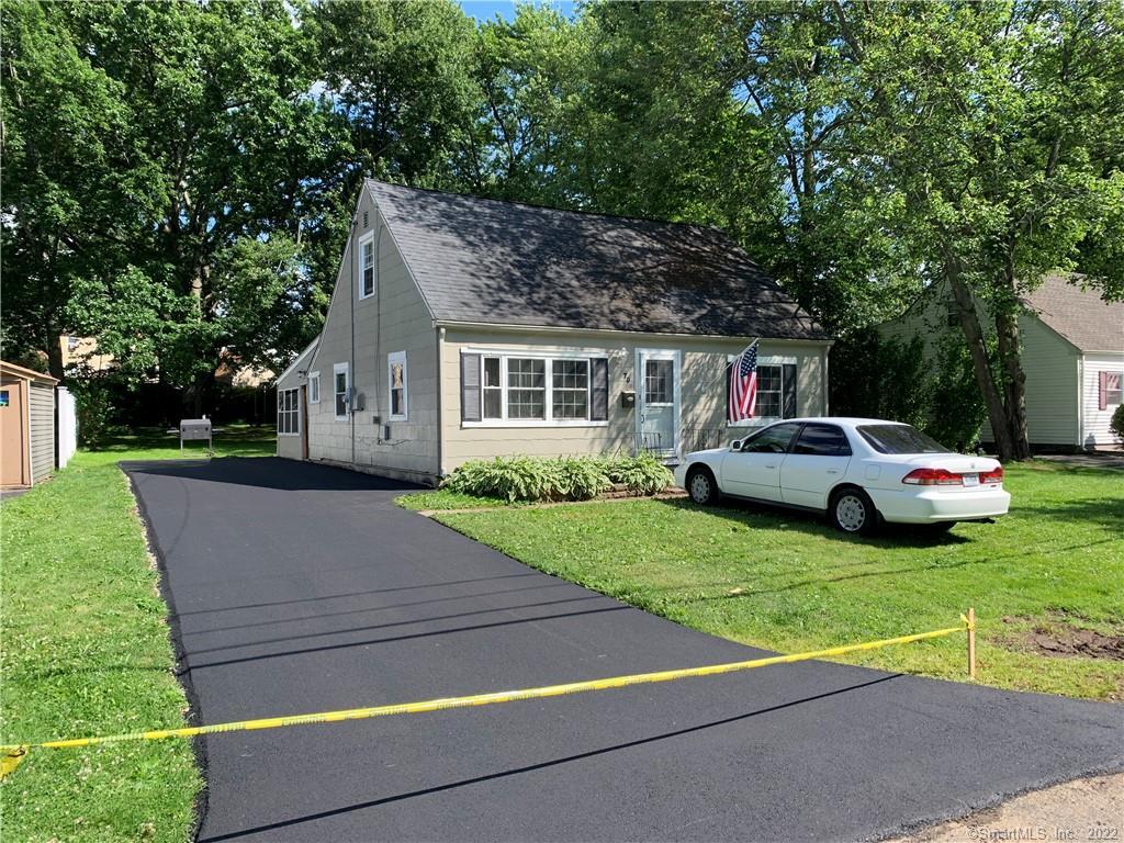 70 Ronald Road New Britain, CT 06053 - Photo 1 of 1 a view of a house with a yard