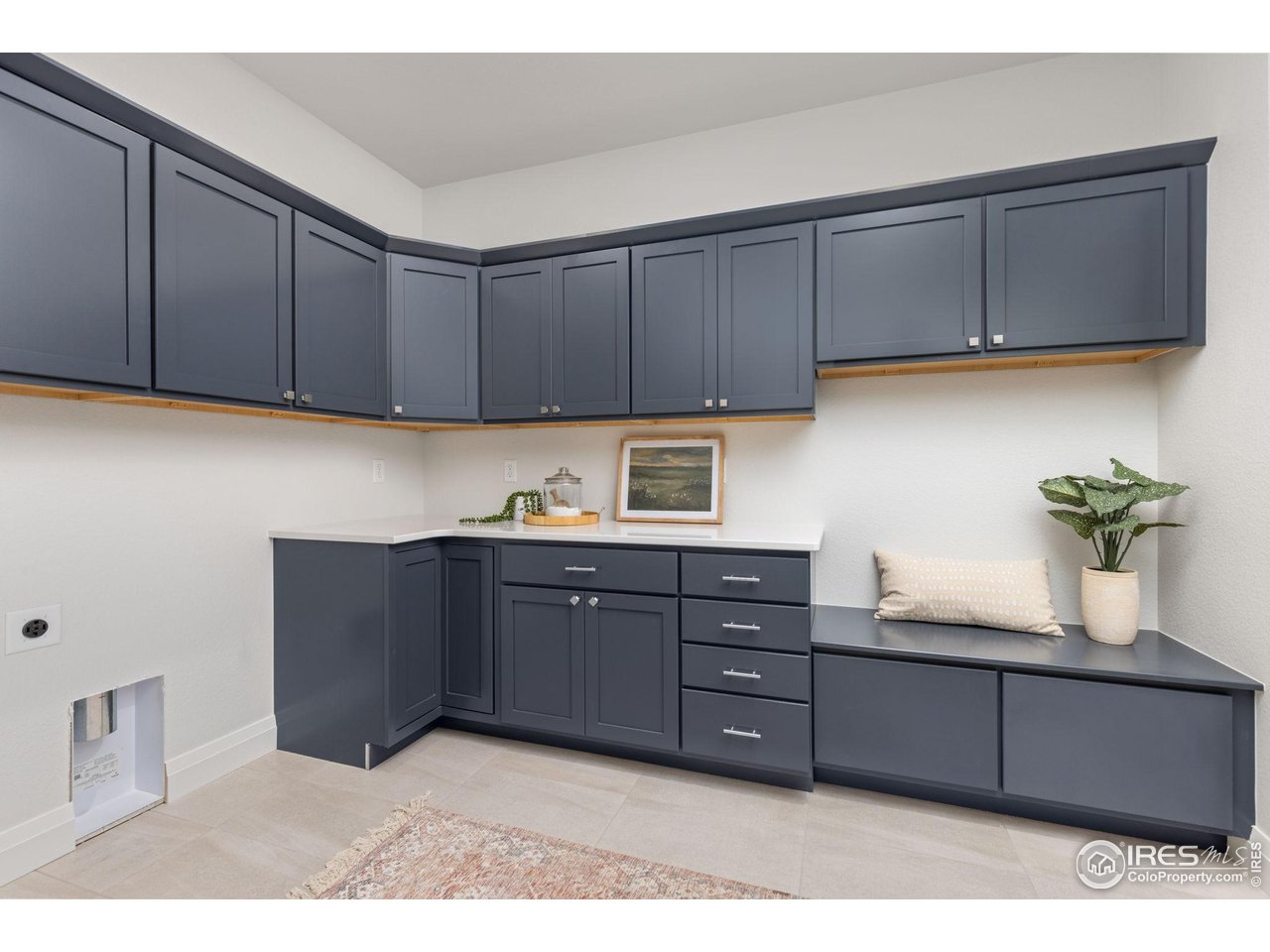 217 57th Avenue Greeley, CO 80634 - Photo 13 of 35 a kitchen with stainless steel appliances granite countertop a cabinets and wooden floor