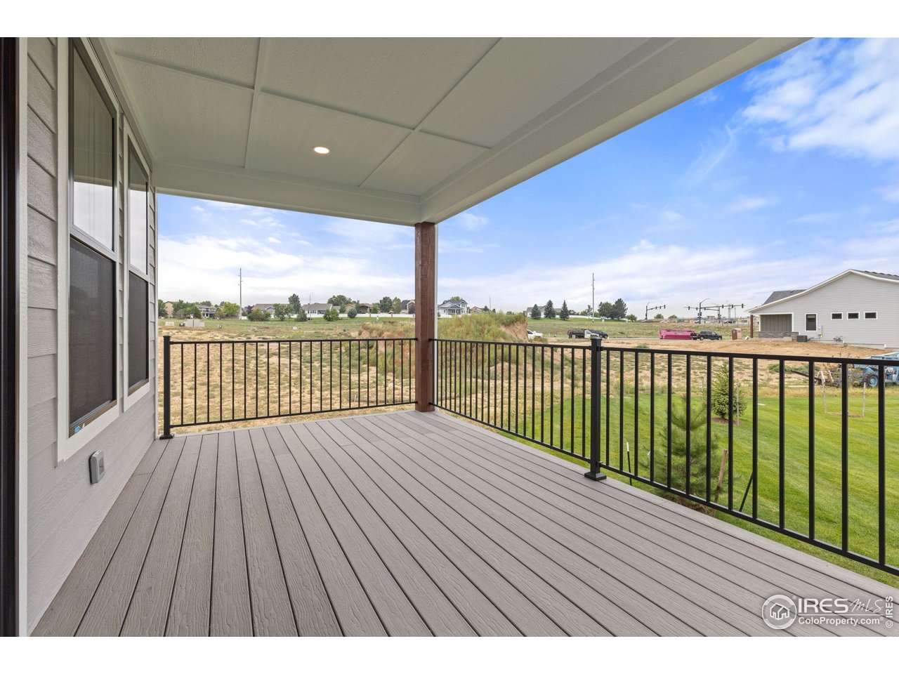217 57th Avenue Greeley, CO 80634 - Photo 29 of 35 a view of balcony with wooden floor