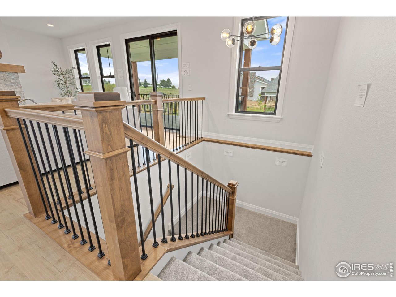 217 57th Avenue Greeley, CO 80634 - Photo 30 of 35 a view interior of a house with wooden floor and windows