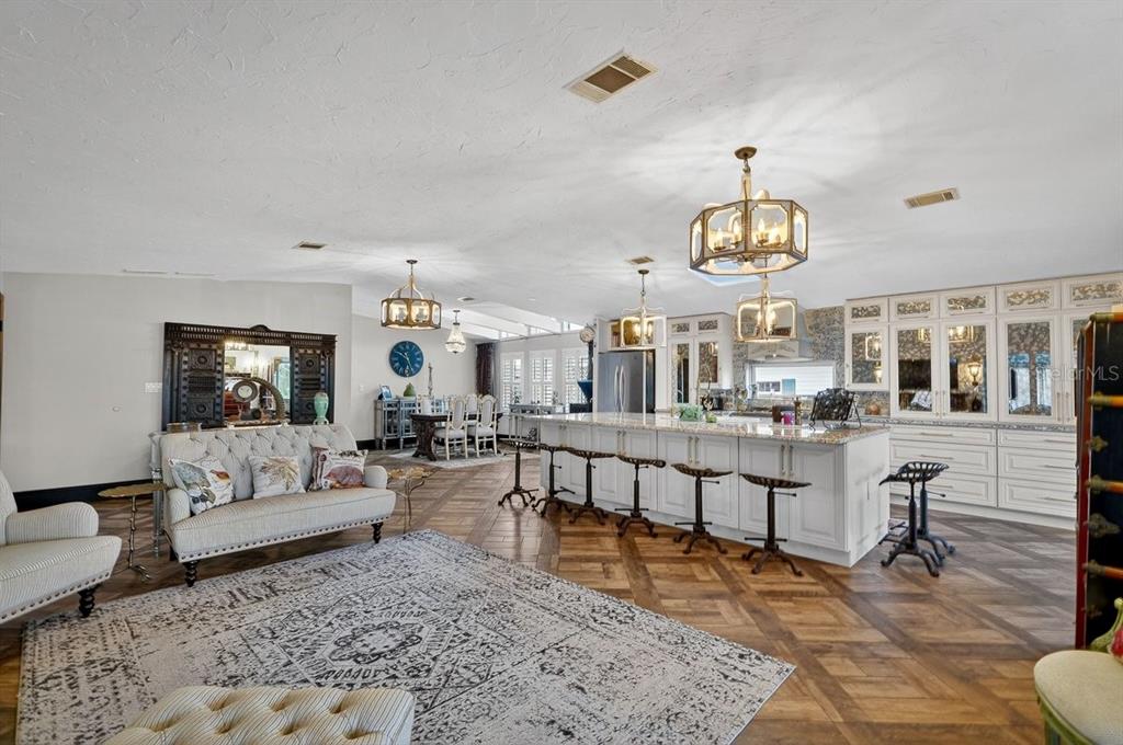 747 Navigators Way Edgewater, FL 32141 - Photo 26 of 73 a living room with furniture and wooden floor