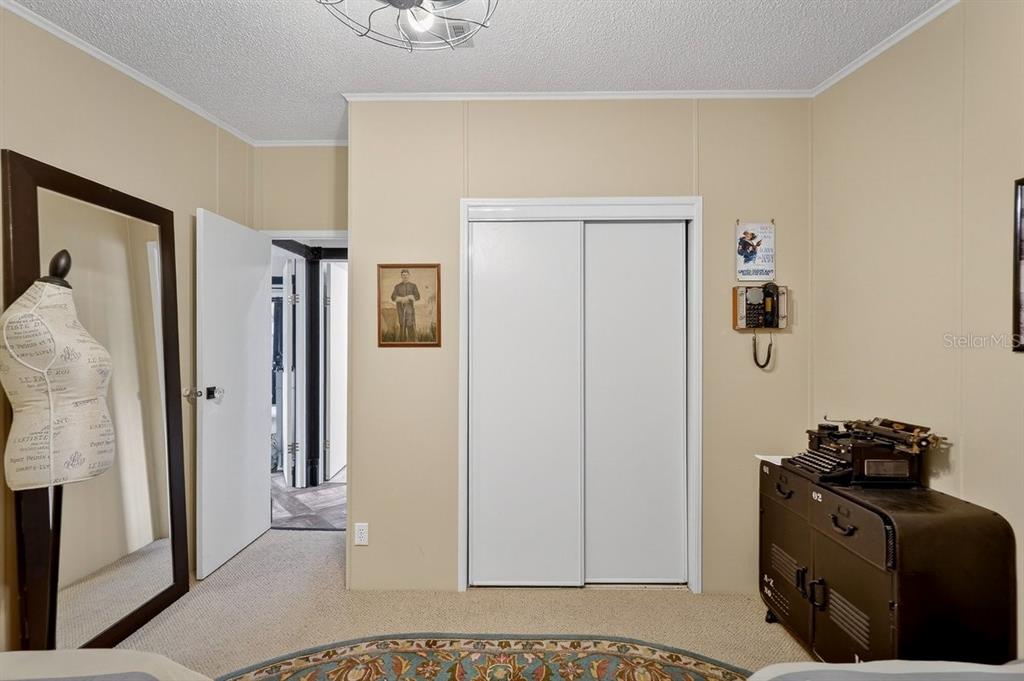 747 Navigators Way Edgewater, FL 32141 - Photo 50 of 73 a view of a livingroom with a washer and dryer