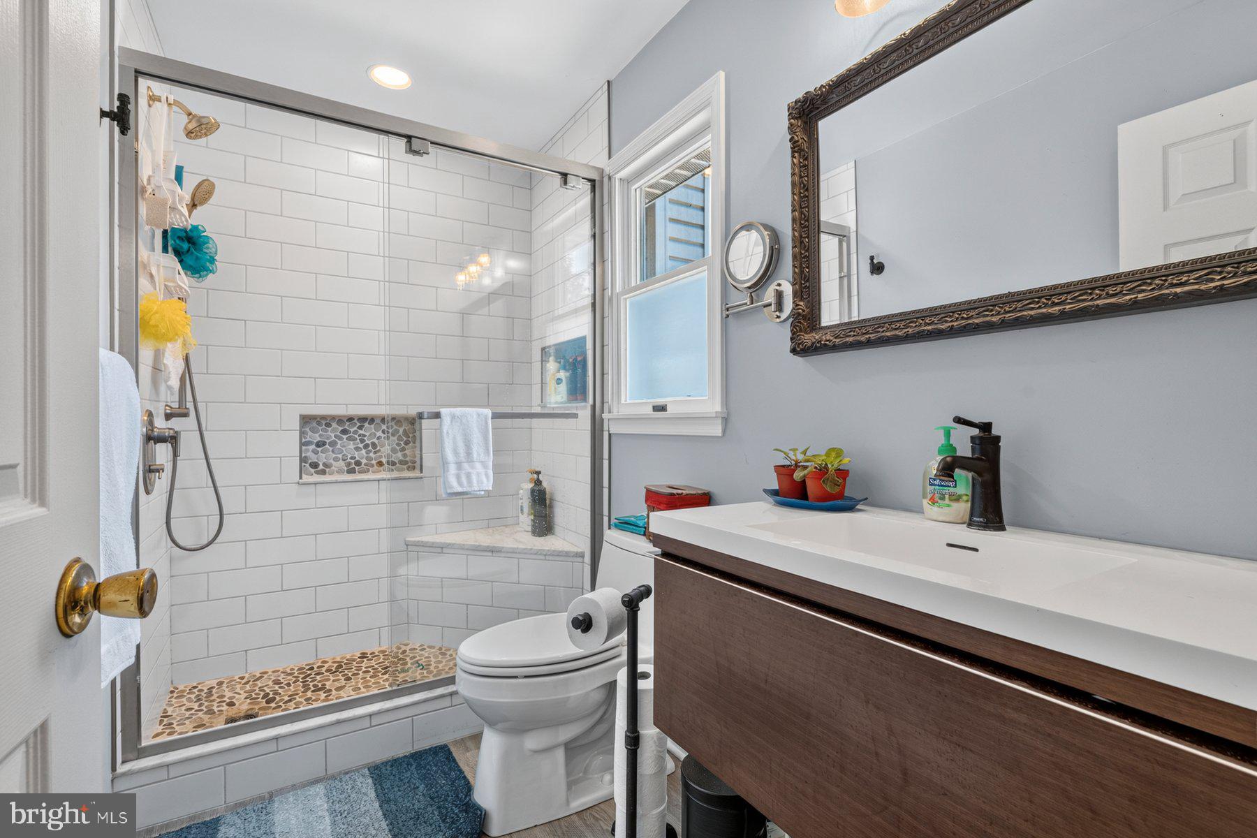 49 Rockland Road Westminster, MD 21158 - Photo 53 of 66 a bathroom with a sink a toilet and shower