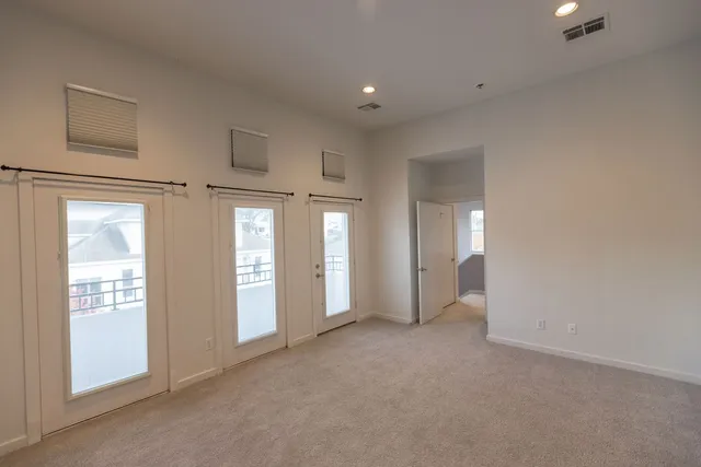 an empty room with windows